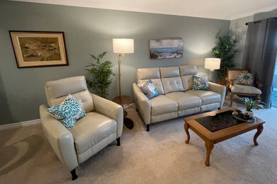 Inspiration for a mid-sized timeless open concept carpeted living room remodel in Other with gray walls