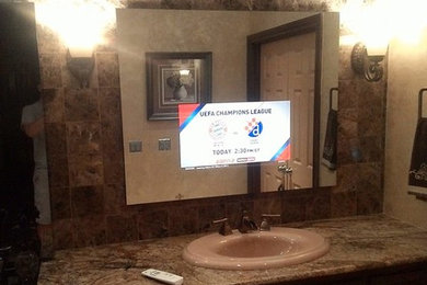 Bathroom - contemporary master bathroom idea in Oklahoma City with raised-panel cabinets, dark wood cabinets, beige walls and granite countertops