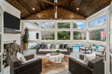 Example of a transitional sunroom design in Nashville