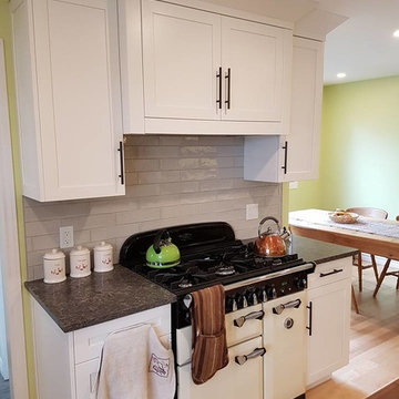 Charming bright white kitchen with adjoining bathroom