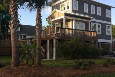 Inspiration for a mid-sized coastal home design remodel in Charleston