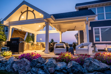 Inspiration for a transitional backyard patio remodel in Milwaukee
