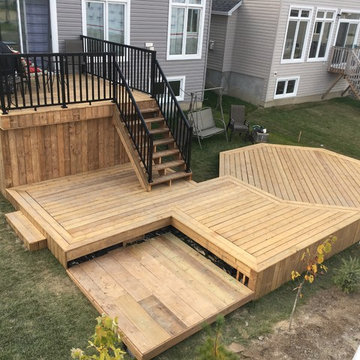 Multiple level deck with a storage space under and a hot-tub place