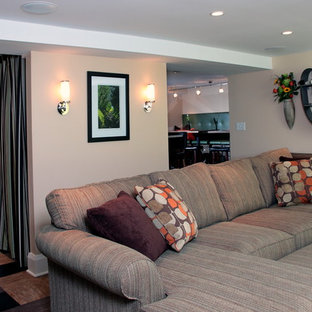 Medium sized traditional open plan home cinema in Milwaukee with beige walls, lino flooring, a wall mounted tv and multi-coloured floors.