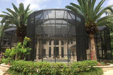 Inspiration for a huge craftsman backyard custom-shaped natural pool remodel in Houston