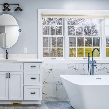 Master Bathroom Remodeled With White Flooring, Bathtub, Shower, Highland MD