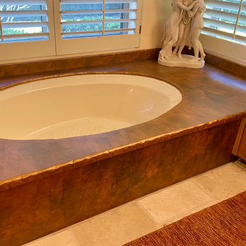 Yellow Onyx Epoxy Countertops with Hammered Copper Tub Surround