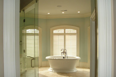 Mid-sized elegant master porcelain tile and beige floor bathroom photo in Other with blue walls and a hinged shower door