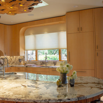 Napa Curved Kitchen in Figured Anigre and Santos veneer