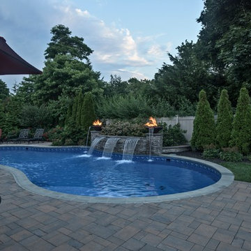 Custom swimming pool with water feature