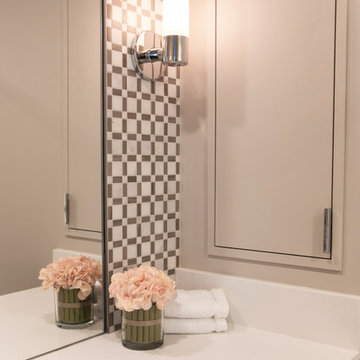 Walnut vanity and white quartz bathroom
