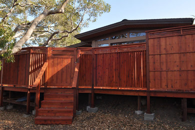 Deck - mid-sized contemporary backyard deck idea in San Luis Obispo with a fire pit and no cover