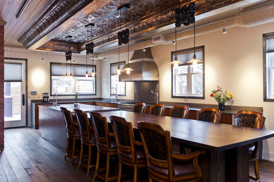 Inspiration for a transitional kitchen remodel in Toronto with flat-panel cabinets, medium tone wood cabinets and quartz countertops