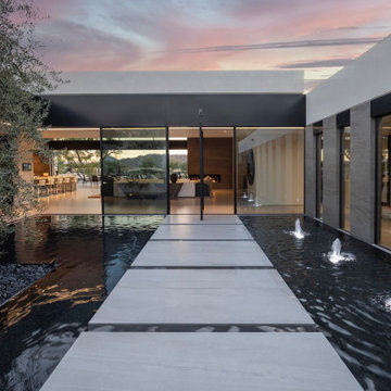 Bighorn Palm Desert luxury modern home front entrance walkway water feature