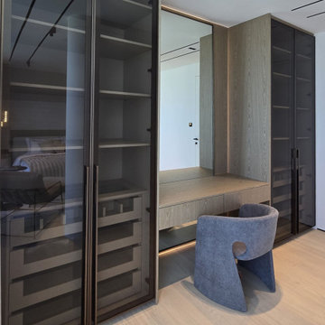 Bedroom Dressing Area with Smoked Glass Wardrobes