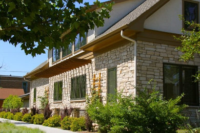 Large traditional white three-story mixed siding gable roof idea in Denver