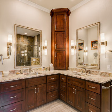 Warm Master Bathroom With Hints of the Outdoors