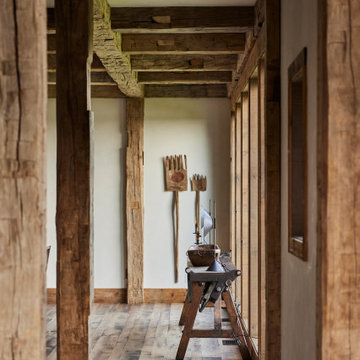 Hand Hewn Timbers in Farmhouse Dining Room Ceiling