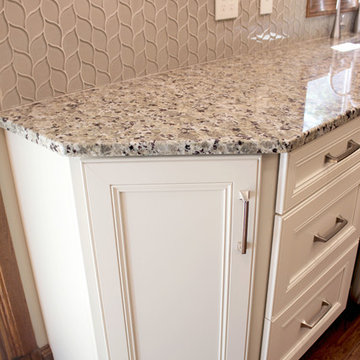 Cream Kitchen with Green Island with Butcher Block Countertop