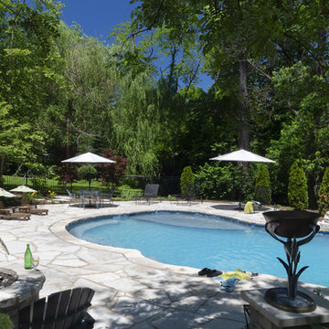 Reflecting look of home with overall pool design