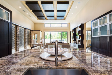 Large trendy u-shaped open concept kitchen photo in Baltimore with an undermount sink, shaker cabinets, dark wood cabinets, granite countertops, stainless steel appliances and an island