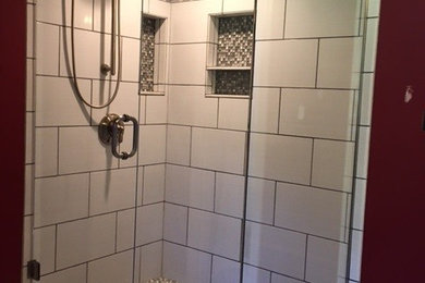Inspiration for a mid-sized timeless master gray tile, white tile and porcelain tile porcelain tile and beige floor alcove shower remodel in Boston with red walls and a hinged shower door