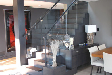 Example of a trendy staircase design in Other