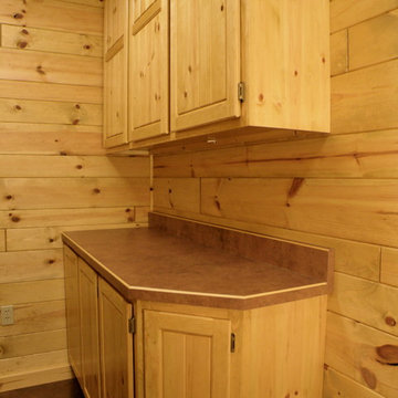 Knotty pine paneling man cave cabinets