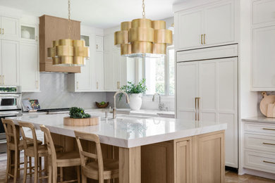 Enclosed kitchen - mid-sized transitional l-shaped terra-cotta tile and beige floor enclosed kitchen idea in Jacksonville with a farmhouse sink, beaded inset cabinets, light wood cabinets, quartz countertops, white backsplash, quartz backsplash, paneled appliances, an island and white countertops
