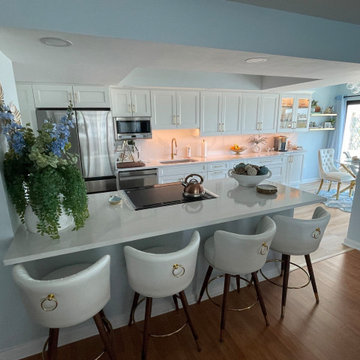 Beautiful Transitional Kitchen Remodel Done in Snow White Colored Cabinets