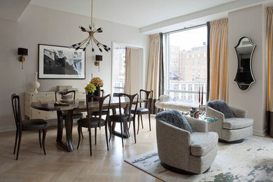 Example of a cottage chic dining room design in New York