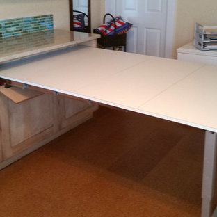 Inspiration for a mid-sized country home office in Miami with beige walls and cork floors.