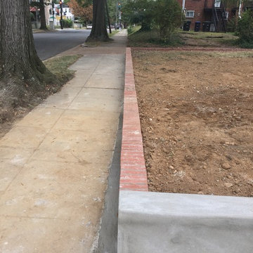 New Concrete Driveway Entrance, Retaining Walls, and New Iron Fence