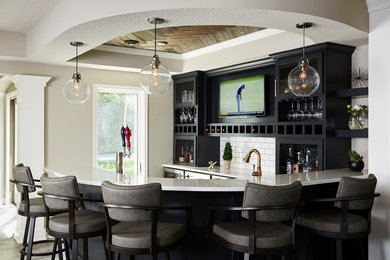 Home bar - large country home bar idea in Minneapolis with white countertops