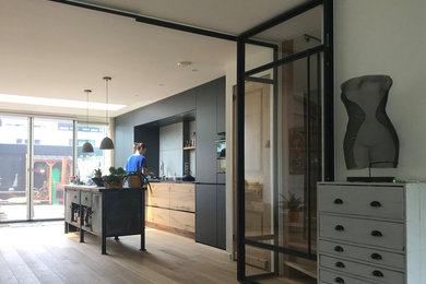 Urban family room photo in Amsterdam