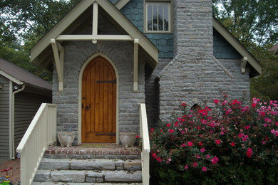 Inspiration for a small victorian gray one-story mixed siding gable roof remodel in Other