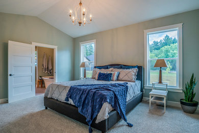 Bedroom - contemporary master carpeted and beige floor bedroom idea in Portland with green walls and no fireplace