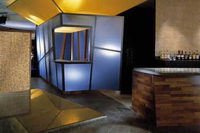 Example of a trendy home bar design in Denver