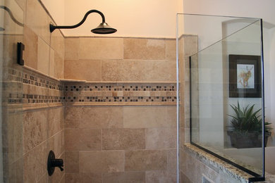 Inspiration for a mid-sized timeless 3/4 beige tile, black tile, brown tile and ceramic tile ceramic tile alcove shower remodel in Phoenix with shaker cabinets, black cabinets, a one-piece toilet, white walls, a vessel sink and wood countertops