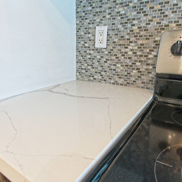 Condo Kitchen with waterfall peninsula