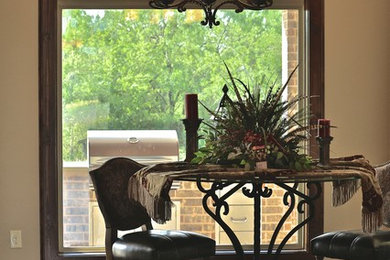 Inspiration for a small mediterranean kitchen/dining room combo remodel in Dallas with beige walls