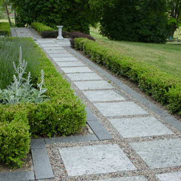 Peterborough, formal hedge and stone pathway