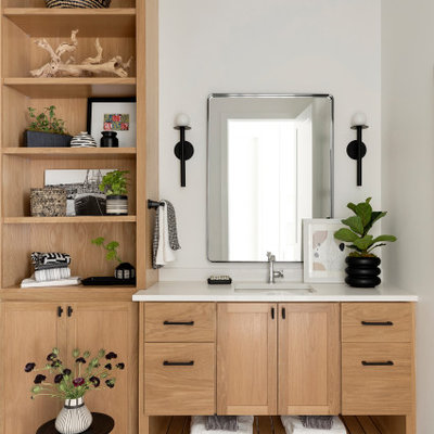 Inspiration for a large coastal 3/4 ceramic tile, multicolored floor and single-sink bathroom remodel in Minneapolis with flat-panel cabinets, light wood cabinets, gray walls, an undermount sink, quartz countertops, white countertops and a built-in vanity