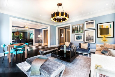 Inspiration for a contemporary living room in New York with blue walls and dark hardwood floors.