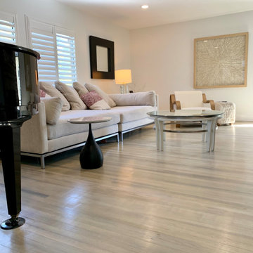 AFTER: RESTORED HARDWOOD FLOORS IN STYLED LIVING ROOM