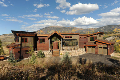 Mid-sized rustic multicolored two-story mixed siding exterior home idea in Denver