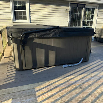 Hot tub installed and wired on the back deck