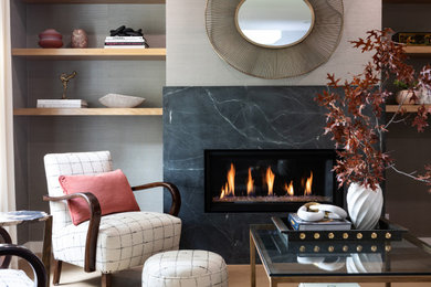 Inspiration for a mid-sized transitional open concept living room in Los Angeles with grey walls, light hardwood floors, a ribbon fireplace, a stone fireplace surround, beige floor and wallpaper.