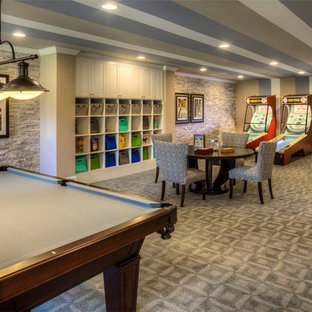 Design ideas for a contemporary fully buried basement in Atlanta with multi-coloured walls, carpet and no fireplace.