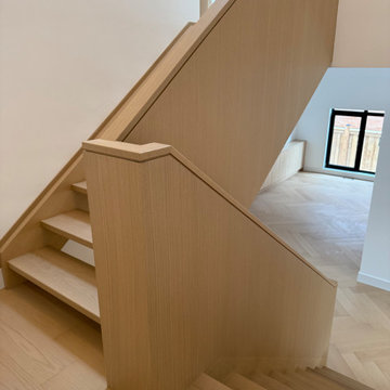 Custom Wood Staircase with Seamless Millwork Detailing – Oakville